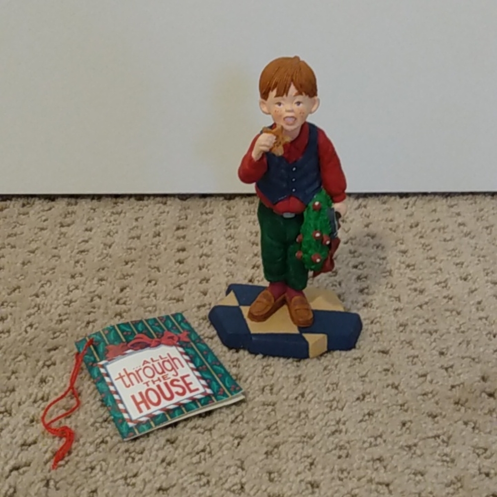 All Through the House Christopher tasting cookies